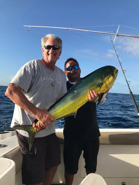 Angler and crew with a mahi-mahi (dorado) in Cabo San Lucas